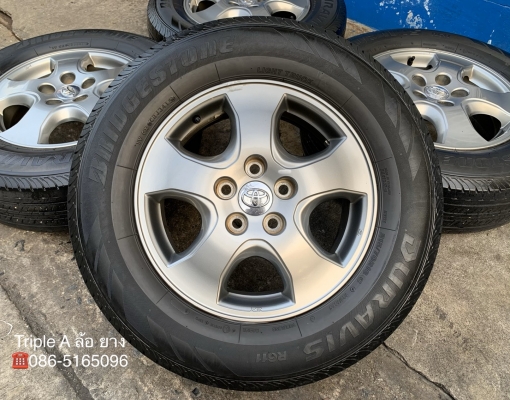ล้อแม็ก Toyota Vigo Champ สีเทาดำ ขอบ 16 พร้อมยาง 215-70-16 Bridgestone ปลายปี 15 ล้อแม็ก Toyota Vigo Champ สีเทาดำ ขอบ 16 พร้อมยาง 215-70-16 Bridgestone ปลายปี 15