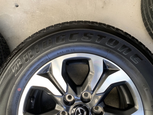 ล้อแม็กป้ายแดง Mazda BT50 Pro ขอบ17 สีเทาหน้าเงา พร้อมยางป้ายแดง 265-65-17 Bridgestone ปี 19 สวยๆ
