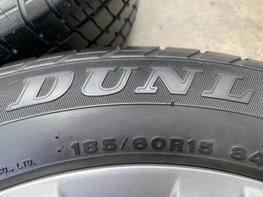 ล้อแม็ก Toyota Vios รุ่น 12 ก้าน ขอบ 15 สีรมดำ พร้อมยาง 185-60-15 Dunlop ปี 16 สภาพดี