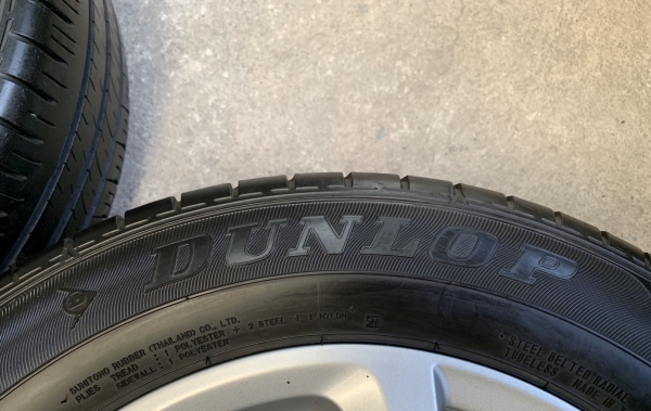 ล้อแม็ก Mazda 2 ขอบ 15 สีบอร์น พร้อมยาง 185-65-15 Dunlop ปี 16