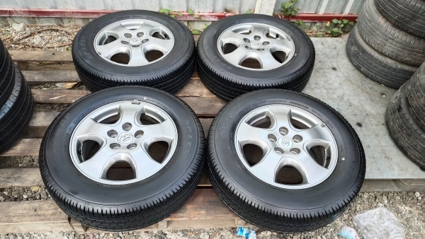 ขายแม็กTOYOTA VIGOเทาดำ ยาง215/65R16 ไฟร์สโตน ปลายปี18 ชุดละ 6900 บาท พร้อมบริการใส่ ถ่วง ล้อเก่ารับ