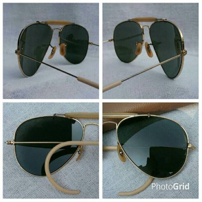 แว่นตา 'เรย์ - แบน - แสนสะท้าน' ยูเอสเอ ตัวแท้ !  ทศวรรษที่ '70s  ขนาดมาตรฐาน 58 mm  โมเดลอมตะ 'แมคอาร์เธอร์ - เอาท์ดอร์สแมน - คานหุ้มงา - ขาสปริงเกี่ยว'  สภาพวินเทพใช้งานถนอม  โคตรเลนส์กระจกคริส