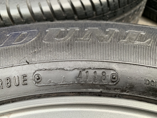 ล้อแม็ก Toyota Vigo Champ สีเทาดำ ขอบ 16 พร้อมยางน้องๆป้ายแดง 215-65-16 Dunlop ปลายปี 18 สภาพดี