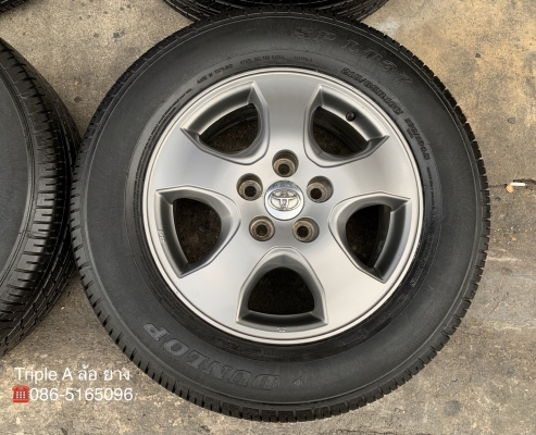 ล้อแม็ก Toyota Vigo Champ สีเทาดำ ขอบ 16 พร้อมยางน้องๆป้ายแดง 215-65-16 Dunlop ปลายปี 18 สภาพดี