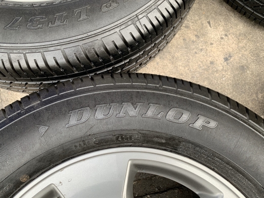 ล้อแม็ก Toyota Vigo Champ สีเทาดำ ขอบ 16 พร้อมยางน้องๆป้ายแดง 215-65-16 Dunlop ปลายปี 18 สภาพดี