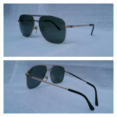 แว่นตาสำหรับนักสร้างสถิติ  'กินเนสส์ เวิลด์ เรคคอร์ดส์'  ไททาเนียมบริสุทธิ์สายพันธุ์ผู้ดีอังกฤษ  งานทองเดินลาย  ***เลนส์กระจกคริสตัล 'สีเขียวควันไฟ'  สภาพเทพ / เก่าเก็บ / ใหม่กริ๊บ  Vintage GUINNESS W