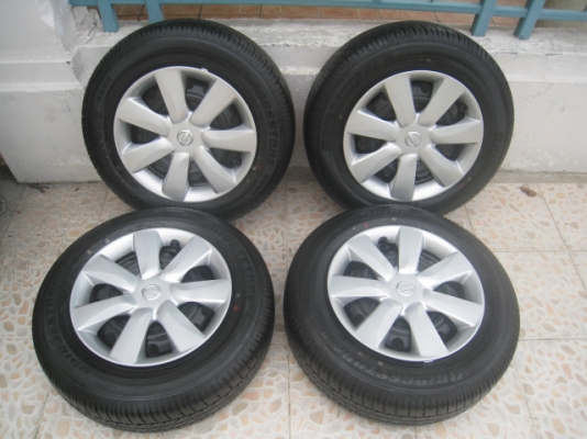ขายล้อกะทะ Nissan almera 4 รู100 +ฝาครอบ+ ยาง Bridgestone b250 175/70 r14 ปี 0713  (081-3747940)