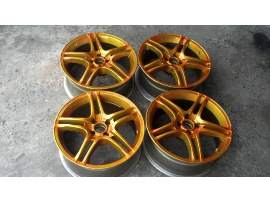 แม็ก 17 แถมยาง 1 ชุด สีทองเหลือบแก้ว 4 รู 100