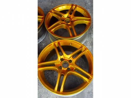 แม็ก 17 แถมยาง 1 ชุด สีทองเหลือบแก้ว 4 รู 100