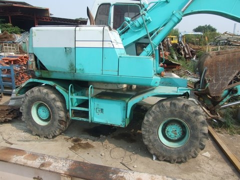 ขายรถแมคโคล้อยาง KOBELCO  100W  พร้อมลายหัวเจาะ