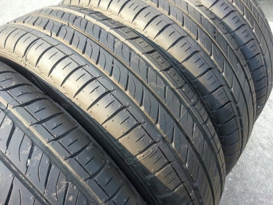 กะทะ14 4รู100 + ยาง Dunlop 165/65/14 ปลายปี12 เส้นขาวๆคมๆเลย