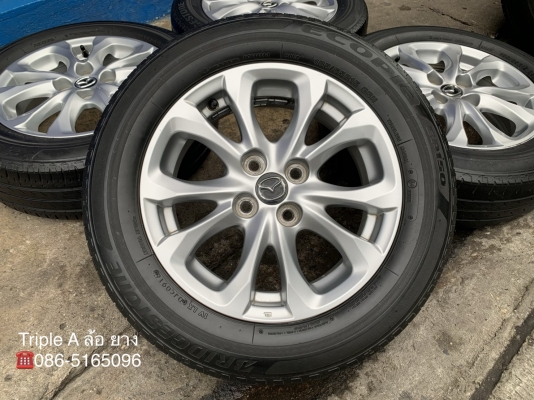 ล้อแม็ก Mazda 2 Skyactiv ขอบ 15 สีบอร์น แถมยาง 185-65-15 Bridgestone ปี 16 ล้อแม็ก Mazda 2 Skyactiv ขอบ 15 สีบอร์น แถมยาง 185-65-15 Bridgestone ปี 16