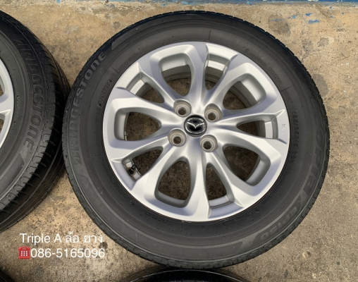 ล้อแม็ก Mazda 2 Skyactiv ขอบ 15 สีบอร์น แถมยาง 185-65-15 Bridgestone ปี 16 ล้อแม็ก Mazda 2 Skyactiv ขอบ 15 สีบอร์น แถมยาง 185-65-15 Bridgestone ปี 16