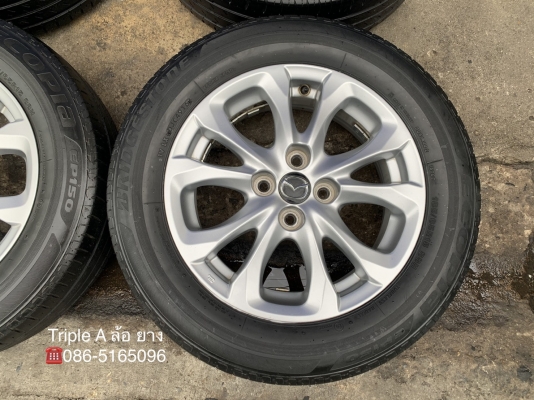 ล้อแม็ก Mazda 2 Skyactiv ขอบ 15 สีบอร์น แถมยาง 185-65-15 Bridgestone ปี 16 ล้อแม็ก Mazda 2 Skyactiv ขอบ 15 สีบอร์น แถมยาง 185-65-15 Bridgestone ปี 16