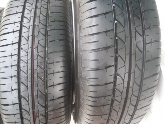 ขายล้อกะทะ Nissan almera 4 รู100 +ฝาครอบ+ยาง175/70 r14 ปี 0713  (081-3747940)