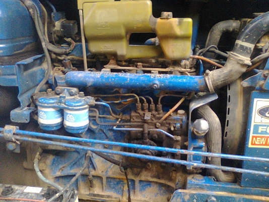 ขายรถไถฟอร์ด 6610พร้อมเล่มทะเบียนเสื้อลาย