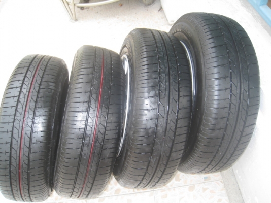 ขายล้อกะทะ Nissan almera 4 รู100 +ฝาครอบ+ยาง175/70 r14 ปี 0713  (081-3747940)