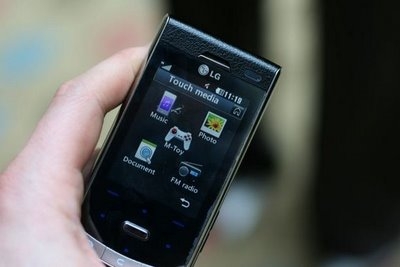 ขายโทรศัพท์พร้อมใช้ของใหม่  LG KF750 ครบยกกล่อง