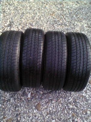 ขายแม็กHONDAพร้อมยาง 4 รู ขอบ14 185/65R14 ยางดีสโตร์ ปี11 สวยๆ 1 ชุด