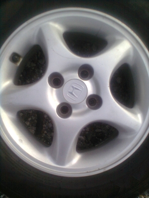 ขายแม็กHONDAพร้อมยาง 4 รู ขอบ14 185/65R14 ยางดีสโตร์ ปี11 สวยๆ 1 ชุด