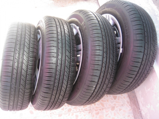 ขายกะทะล้อ honda city ขอบ15+ฝาครอบ +ยางป้ายแดงปี0813 (081-3747940)