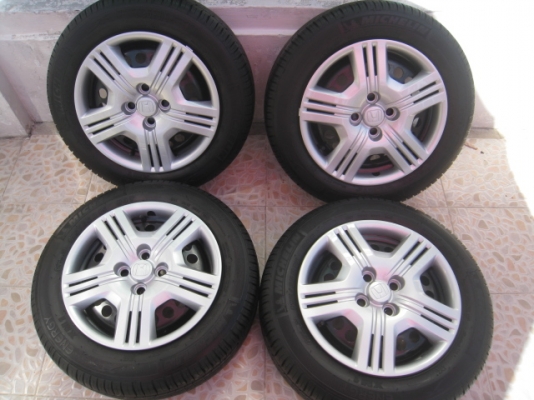 ขายกะทะล้อ honda city ขอบ15+ฝาครอบ +ยางป้ายแดงปี0813 (081-3747940)