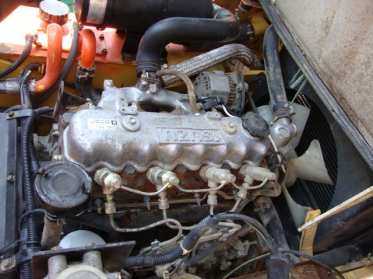 ขายรถโฟล์คลิฟท์  T.C.M.  FD25-Z5   เครื่องยนต์ดเซล  เกียร์ธรรมดา  ฮิ้งโฟล์ค  ล้อหน้าคู่ งากระดกได้  ยางตัน  งา 1,070  มม. เสาสูง  3  เมตร