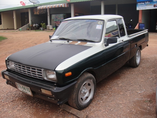 ขายมาสด้า 1300 สีเขียว มีแอร์ ติดแก๊สแล้ว ทะเบียนเต็มพร้อมโอน