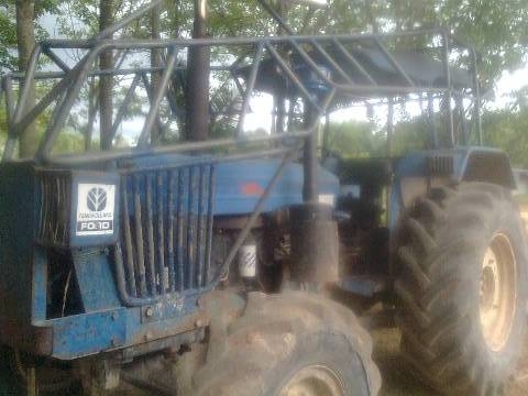 ขายรถไถ FORD AT6610 2 เพลา NEWHOLLAND รถห้างแท้ เครื่องยนต์ 4 สูบ 90 แรงม้า เอกสารเล่มทะเบียน 3 จาน 7 จาน ใบมีดดันหน้า ราคา 850000