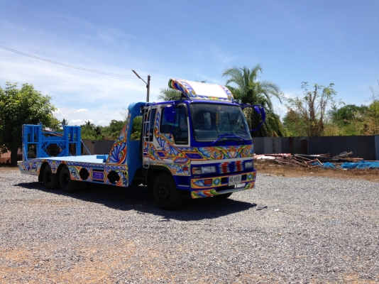 รถเทลเลอร์บรรทุกรถเกี่ยวข้าว