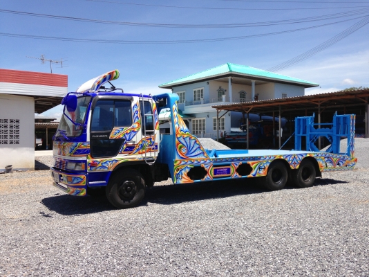 รถเทลเลอร์บรรทุกรถเกี่ยวข้าว