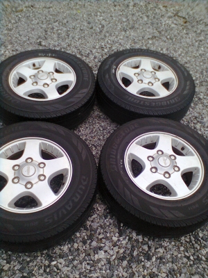 ขายแม็ก ISUZU 6 รู พร้อมยาง บริสโตร์ 215/70R15 ยางสัปดาห์ที่48 ปี12 สวยๆ  1 ชุด