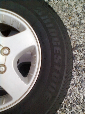 ขายแม็ก ISUZU 6 รู พร้อมยาง บริสโตร์ 215/70R15 ยางสัปดาห์ที่48 ปี12 สวยๆ  1 ชุด