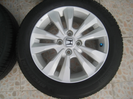 ขายล้อแม็ก Honda city 15"x5.5" et 45 4รู100 + ยางปี 4412  (081-3747940)