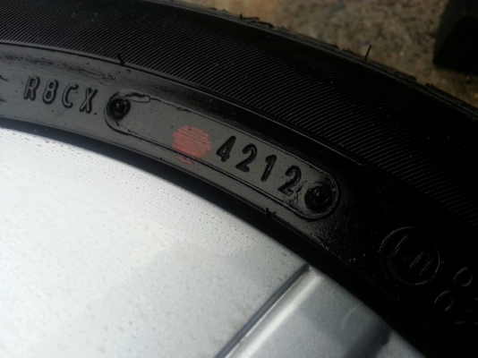 กะทะ14 4รู100 ดุมกลางใหญ่ + ยาง Dunlop 165/65/14 ปลายปี12 ถอดป้ายแดง