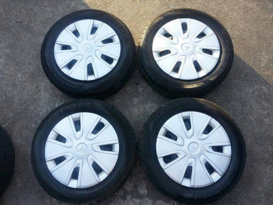 กะทะ14 4รู100 ดุมกลางใหญ่ + ยาง Dunlop 165/65/14 ปลายปี12 ถอดป้ายแดง