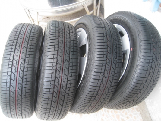ขายกะทะล้อ Suzuki 4รู100+ ฝาครอบ + ยางป้ายแดง 175/65r15 มี 2ชุดครับ ปี1813,2013 (081-3747940)