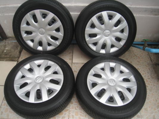ขายกะทะล้อ Suzuki 4รู100+ ฝาครอบ + ยางป้ายแดง 175/65r15 มี 2ชุดครับ ปี1813,2013 (081-3747940)