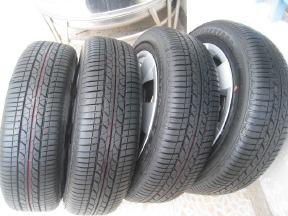 ขายกะทะล้อ Suzuki 4รู100+ ฝาครอบ + ยางป้ายแดง 175/65r15 มี 2ชุดครับ ปี1813,2013 (081-3747940)