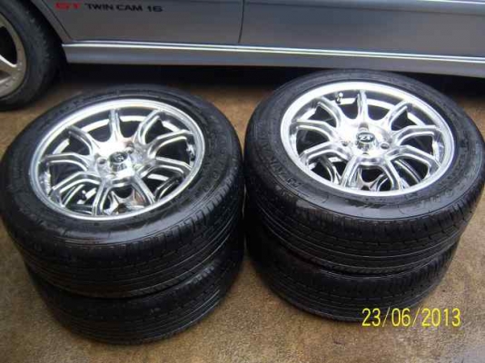 ขายแม็กขอบ 15  4รู100  15x6.5   พร้อมยาง 195 55 15 ปลายปี 12