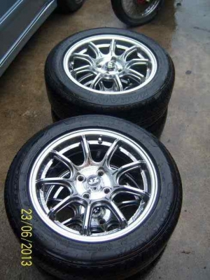 ขายแม็กขอบ 15  4รู100  15x6.5   พร้อมยาง 195 55 15 ปลายปี 12