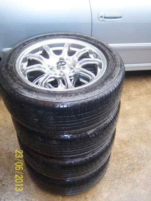 ขายแม็กขอบ 15  4รู100  15x6.5   พร้อมยาง 195 55 15 ปลายปี 12