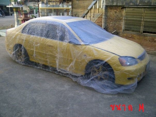 จำหน่าย ผ้าคลุมรถ แบบใส กันน้ำ กันฝุ่น ทำจากพลาสติกแบบหนาเป็นผ้ามัน
