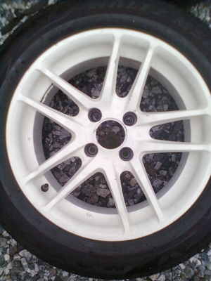 ขายแม็ก 4 รู 100 ขอบ15 พร้อมยาง  185/60R15 ยางmaxxisปี11 จำนวน 1 ชุด