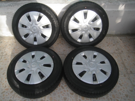 ขายกะทะล้อ Mitsubishi mirage ขอบ14 4รู100 + ฝาครอบ+ ยางปี 12 (081-3747940)