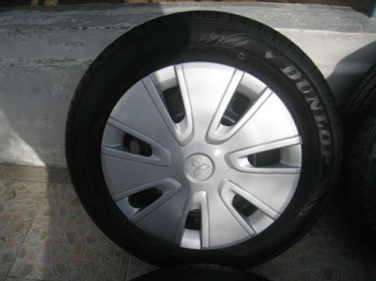 ขายกะทะล้อ Mitsubishi mirage ขอบ14 4รู100 + ฝาครอบ+ ยางปี 12 (081-3747940)