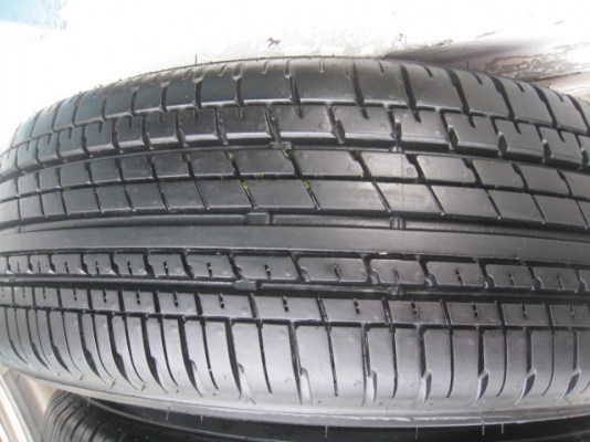 ขายกะทะล้อป้ายแดง Honda jazz + ฝาครอบ + ยางปี 1513  (081-3747940)