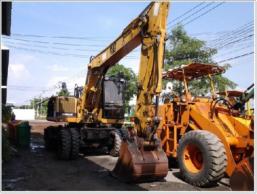 M315 # 7ML00672 รถขุดล้อยางแคต รถนอก นำเข้า by กุ้ง:TOS:081-3062283