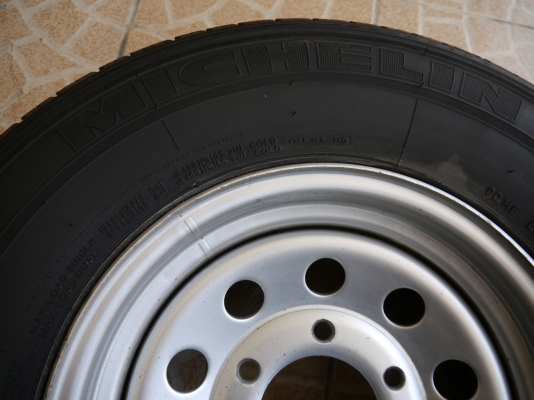 ขายยาง พร้อมกระทะล้อฝ่า 6รู 100 .