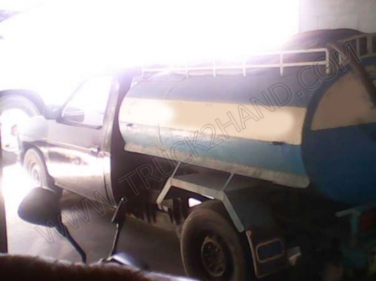 รถกระบะ บรรทุกน้ำ ยี่ห้อ NISSAN รุ่น BIG M รถกระบะ บรรทุกน้ำ ยี่ห้อ NISSAN รุ่น BIG M